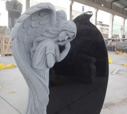 Resting sculpted angel - jet black granite