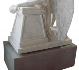 Weeping sculpted  angel on large pedestal